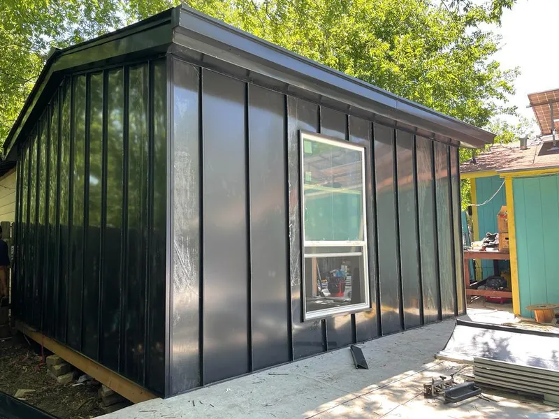 Black standing seam metal wall panels for Roof Inspection in Mansfield